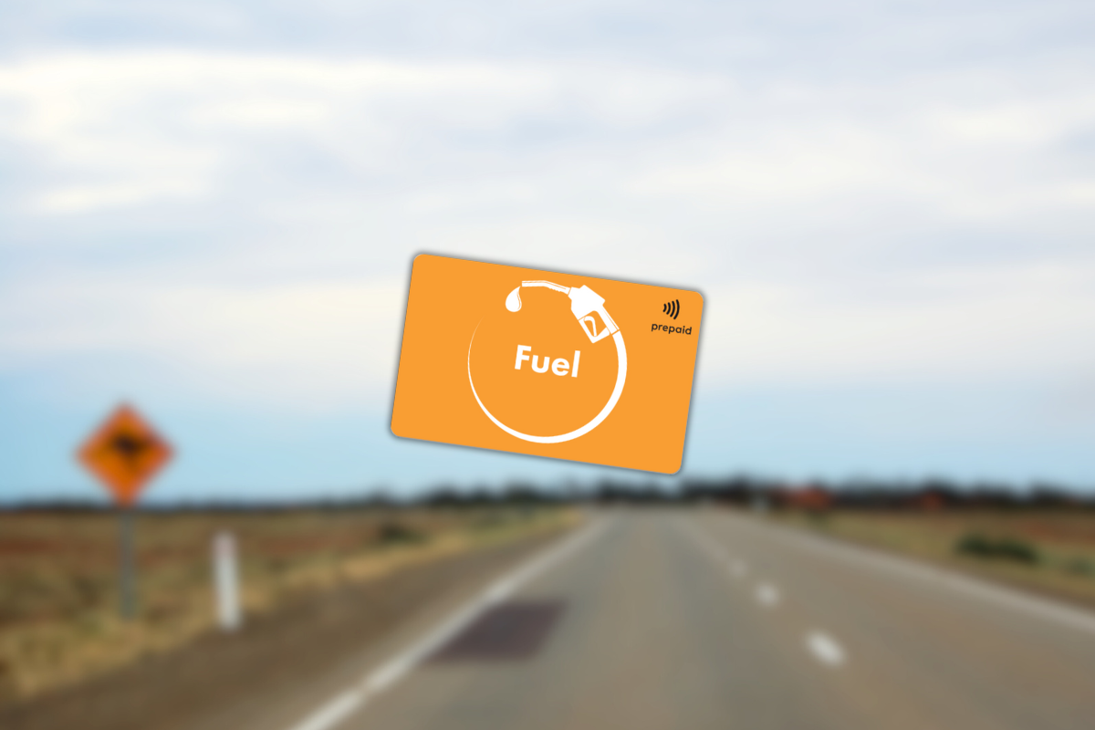 Fuel gift card placed on a remote outback road in Australia, symbolising nationwide fuel card usability across regional and rural areas.