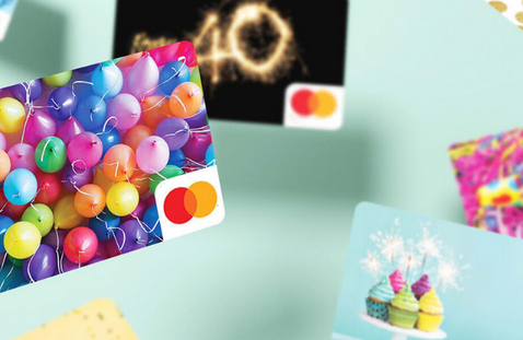 Colorful Mastercard with birthday-themed design on a light blue background