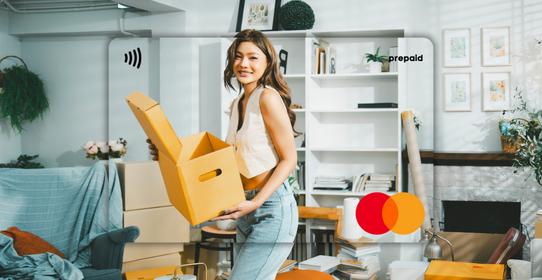 Woman holding a yellow box featured on a Mastercard Personalised Gift Card 