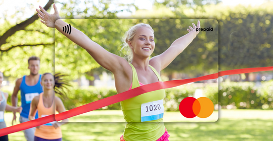Woman crossing a finish line in a race featured on a Mastercard Personalised Gift Card 
