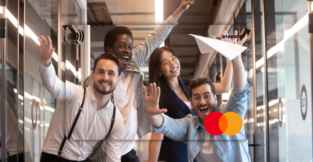 Group of people celebrating with raised arms in an office setting featured on a Mastercard Personalised Gift Card 